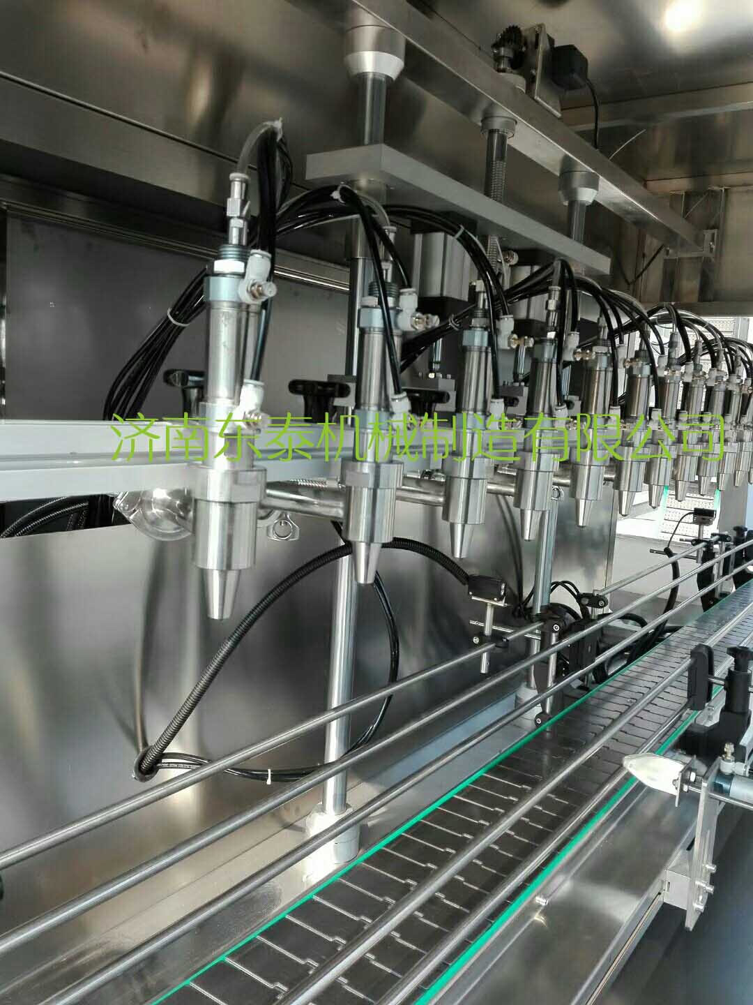 全自動油類灌裝聯(lián)動生產線